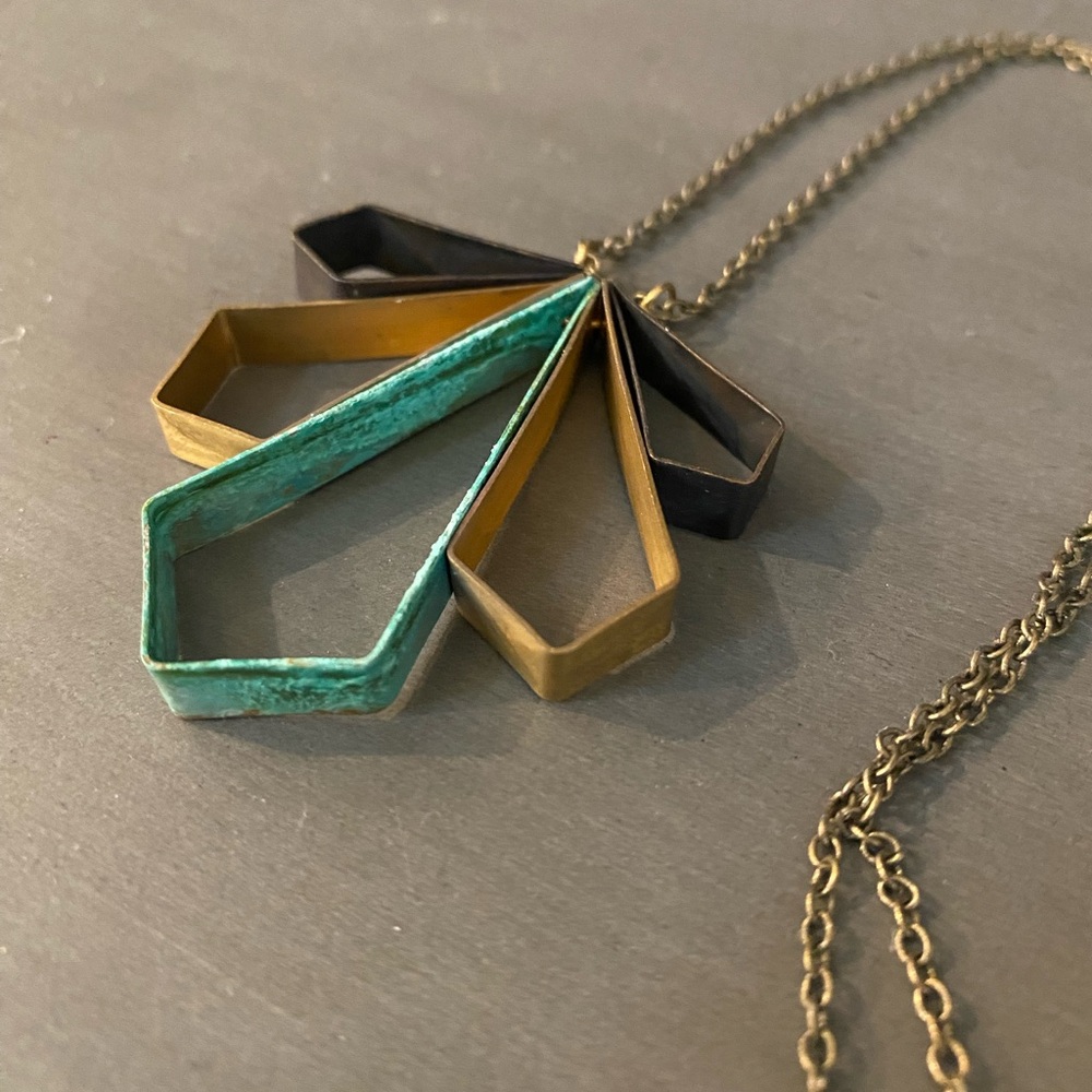 Mixed metal pendant necklace